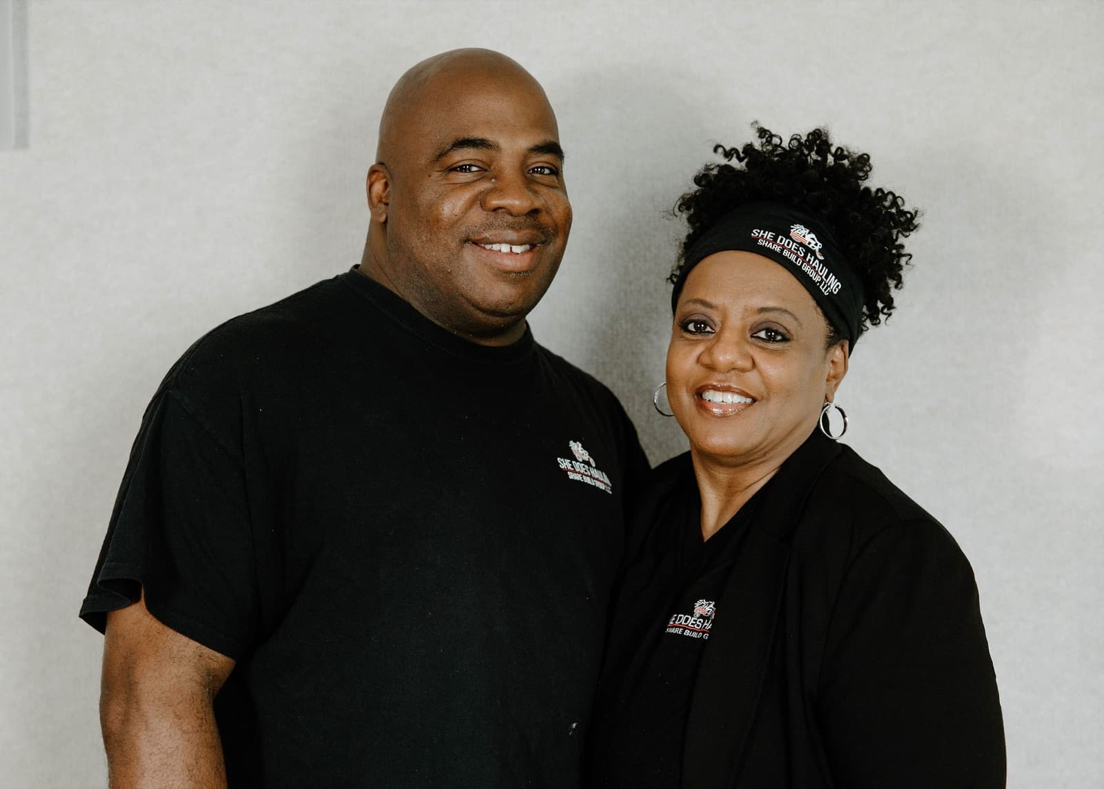 The She Does Hauling team in black uniforms, ready to serve Central PA